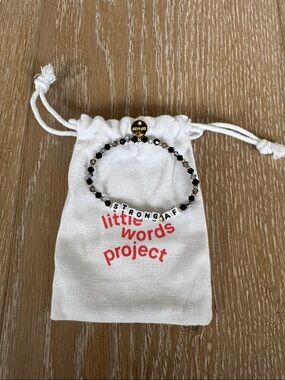 little words project ‘STRONG AF' Black Bead Bracelet. Never worn.